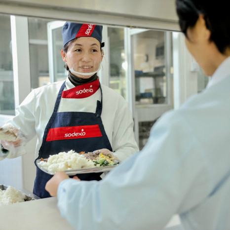 Sodexo chefs preparing food behind a counter