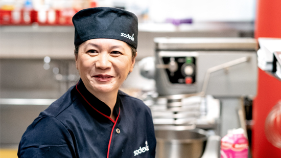 Woman in chef uniform