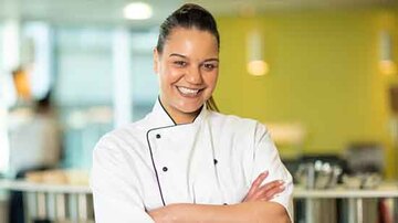 Sodexo chef standing in front of a counter