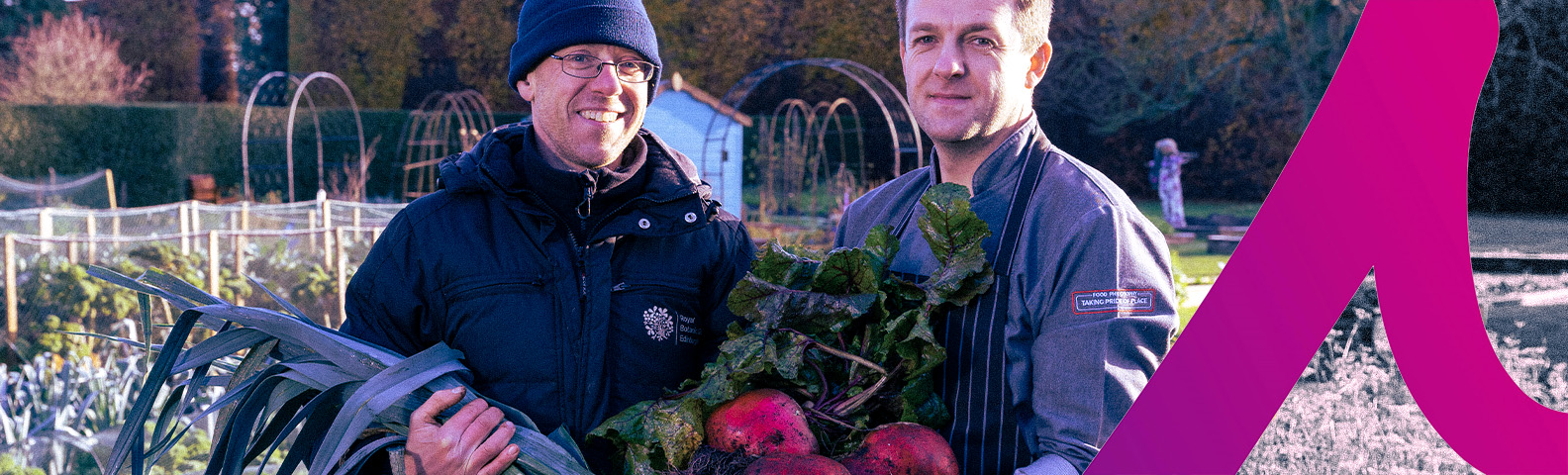 two man holding beets