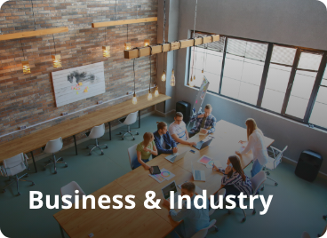 Group of people working together in a modern office. Text on the image says Business &amp; Industry