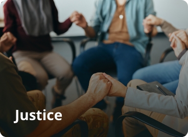 Group of people sitting hand in hand. Text on the image says Justice