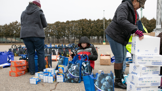 distributing boxes of supplies