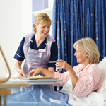 Patient receiving food and care