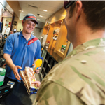 Sodexo employee serving in shop