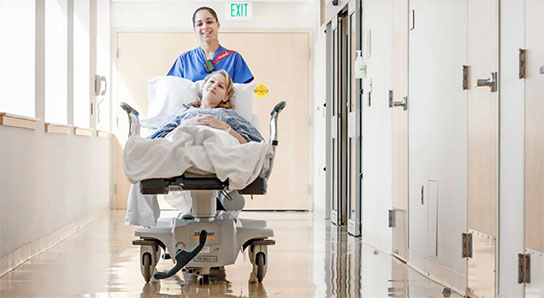 Patient with Sodexo employee in hospital