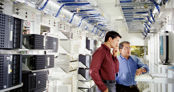 Two men in an IT server room